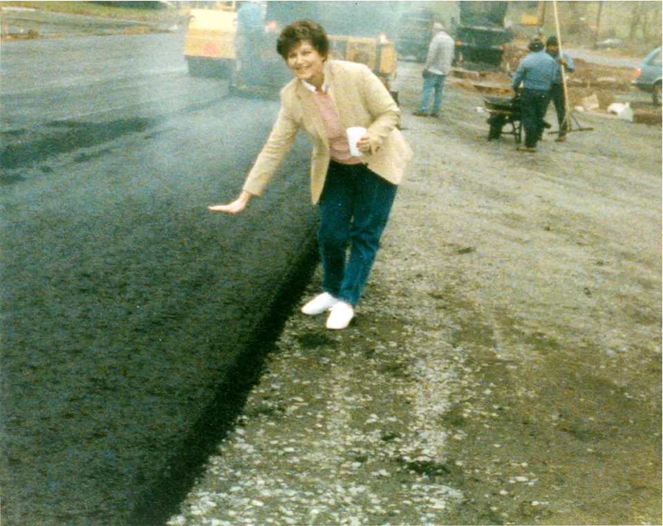 Constance LaRosa, wife of founder Joseph Salvatore LaRosa, admires a fresh paving job.