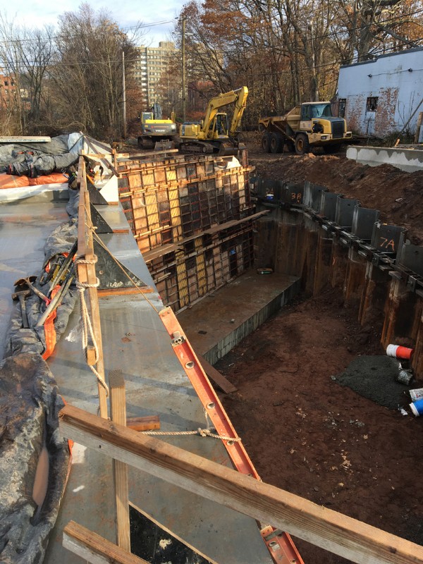 An installed shoring system supporting earth excavation.
