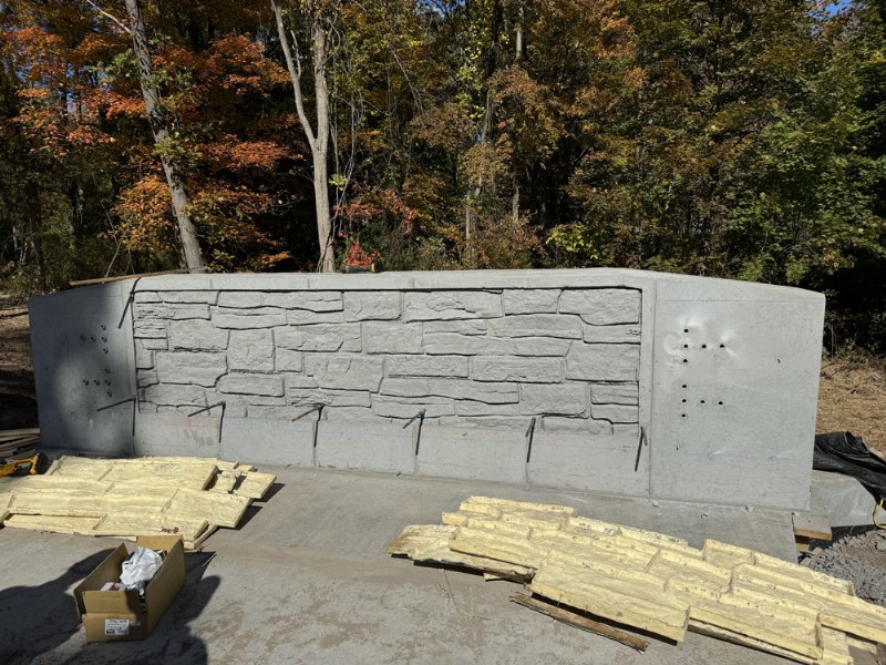 A precast concrete retaining wall installed during the bridge replacement.