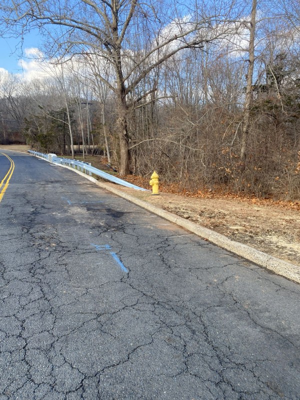 Freshly paved asphalt is seen on the bridge after the replacement.