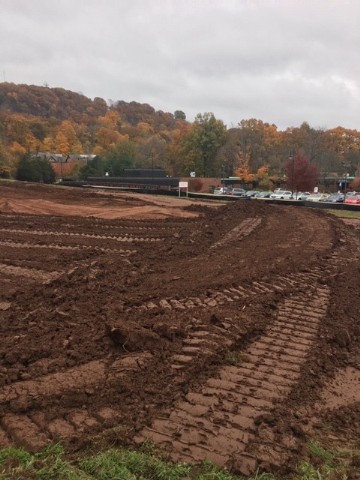 A large pile of dirt created during the site grading process.