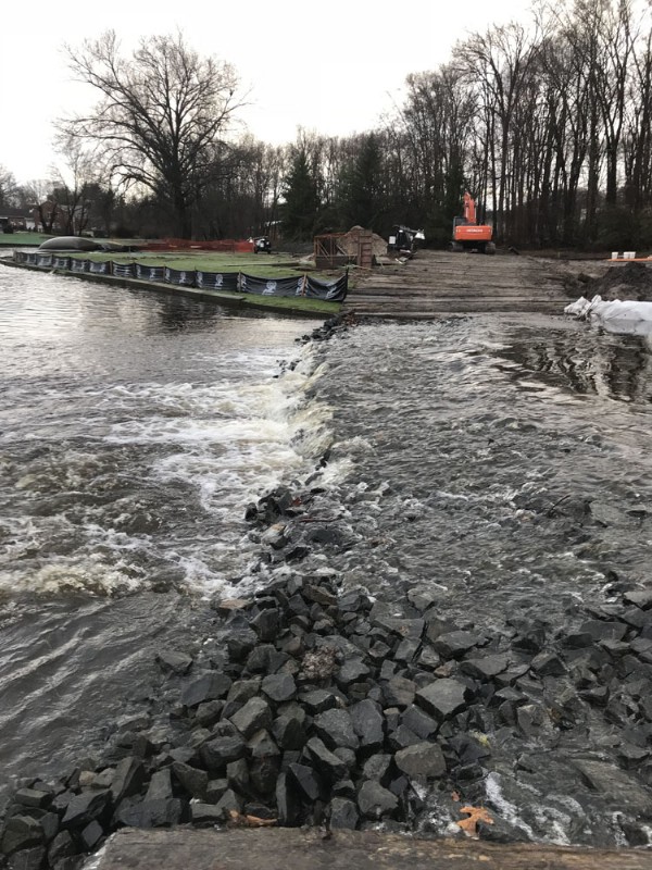 A concrete dam being removed at the construction site.