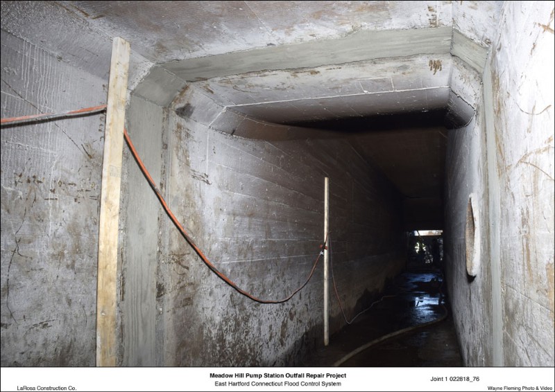 Interior view of the Meadow Hill Pump Station, with cables and hoses put in during construction.