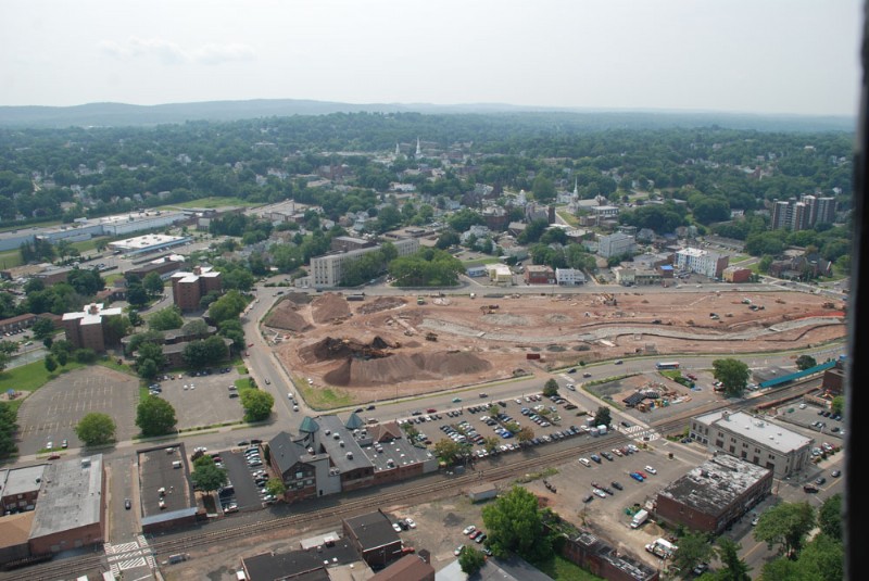 Closer aerial view of the Harbor Brook area during construction, with piles of dirt seen at one end.