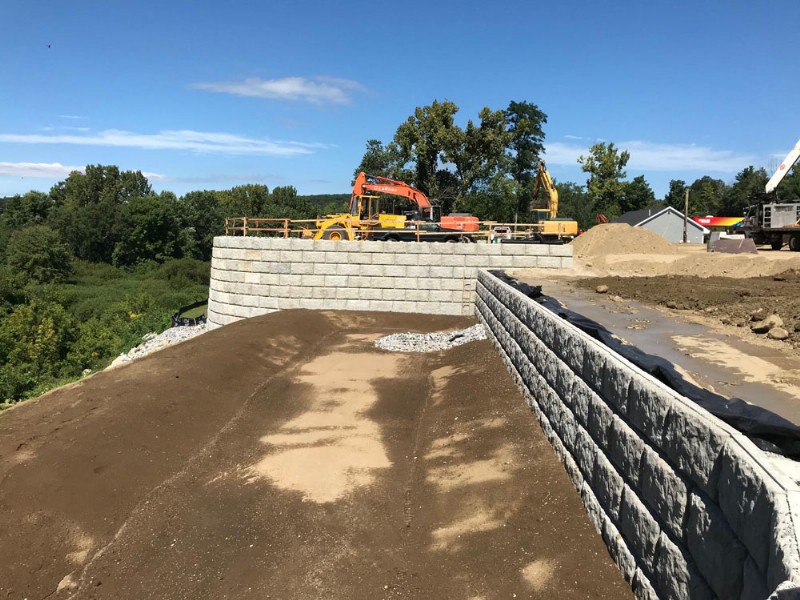 Long view of the newly installed retaining wall.